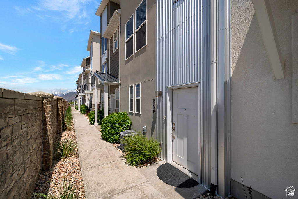 Property entrance with stucco siding