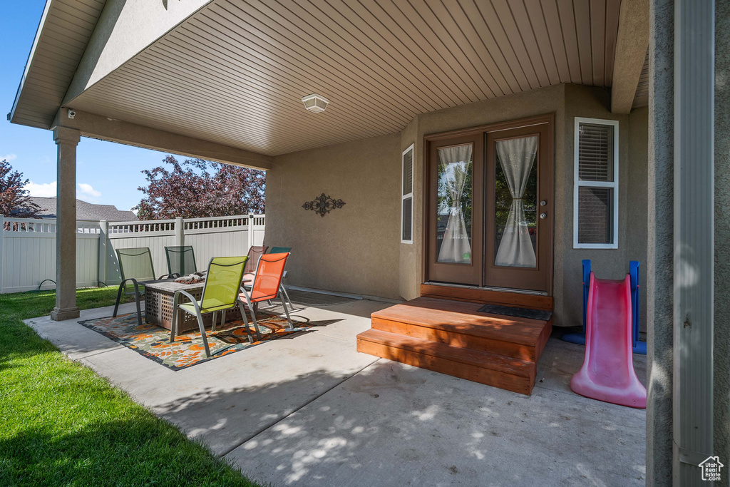 View of patio featuring french doors