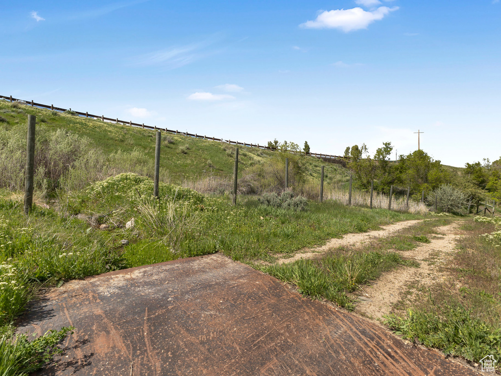 View of yard featuring a view of rural / pastoral area