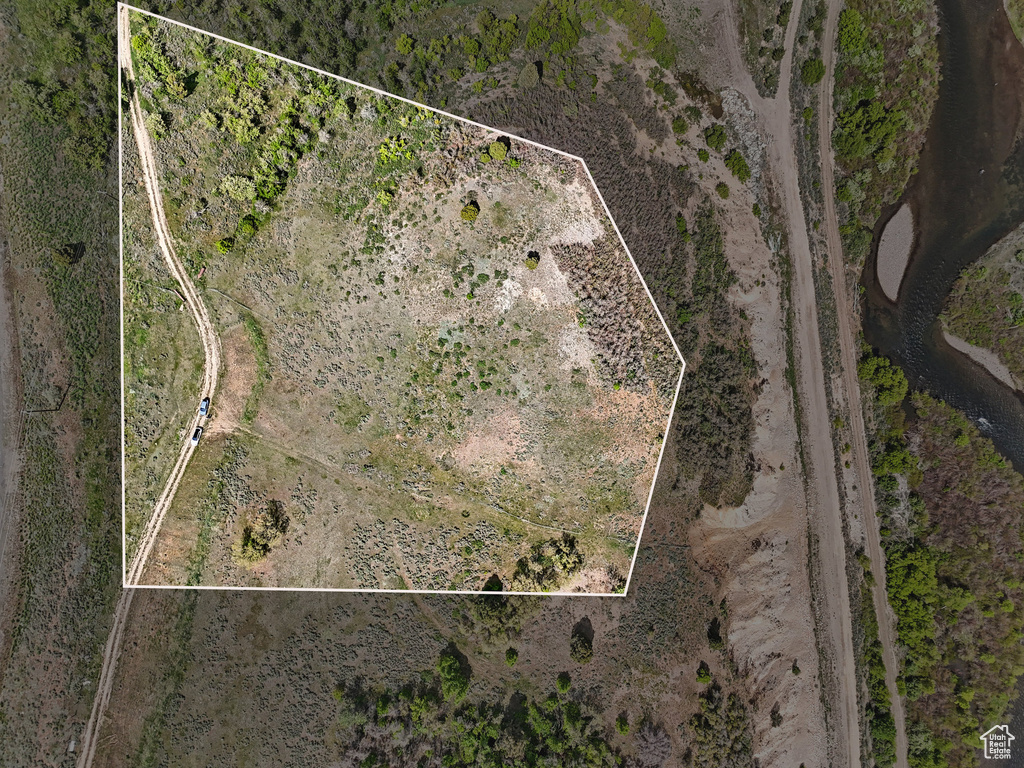 Aerial overview of property's location featuring property boundaries highlighted