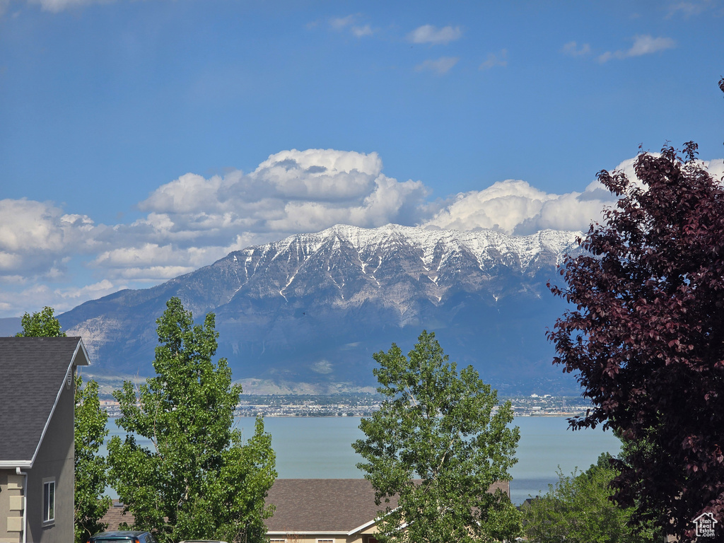 Mountain view featuring a nearby body of water