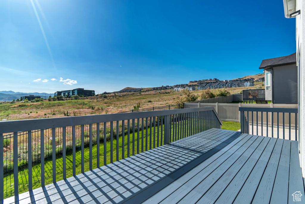 Wooden deck featuring a mountain view