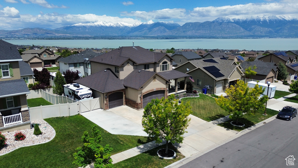 Aerial view of residential area with a water and mountain view