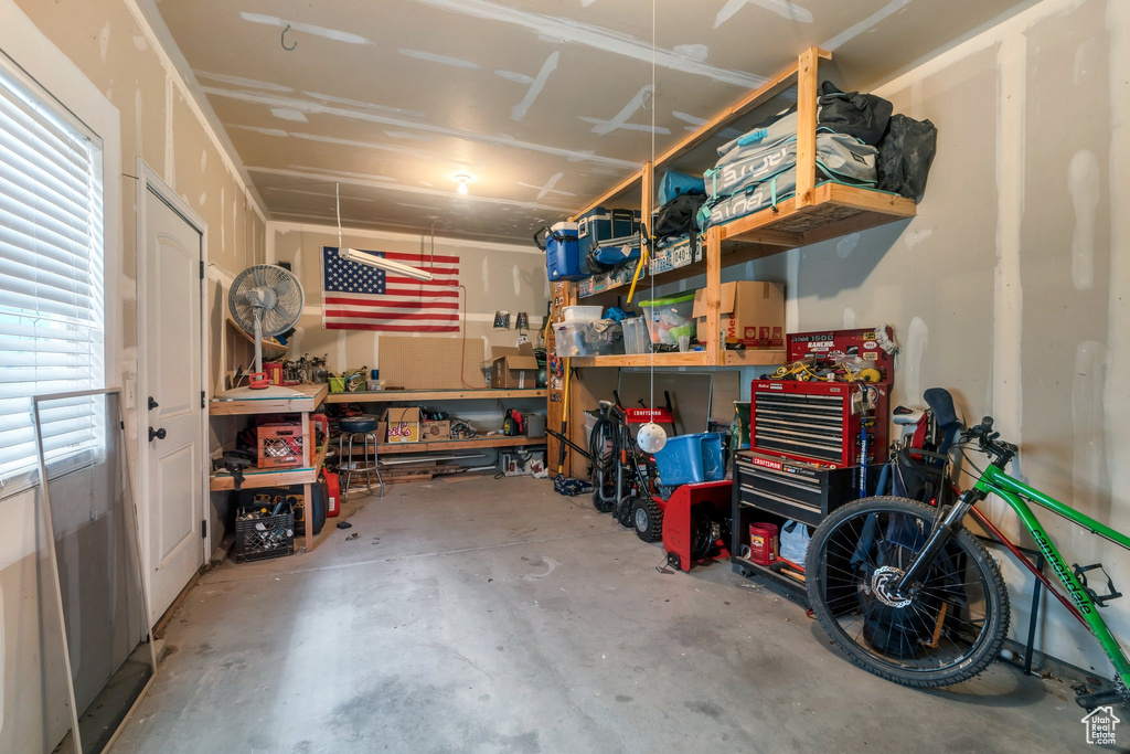 Garage featuring a workshop area