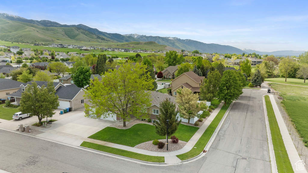 Aerial view of residential area featuring mountains