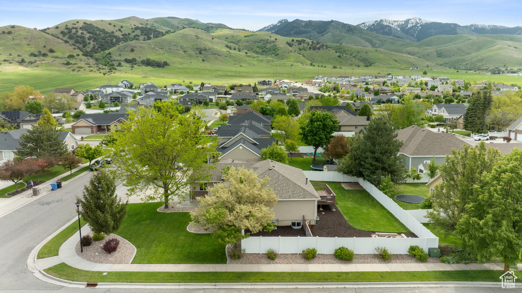 Aerial perspective of suburban area featuring mountains