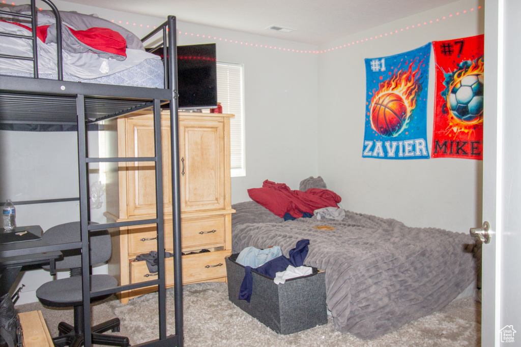 View of carpeted bedroom