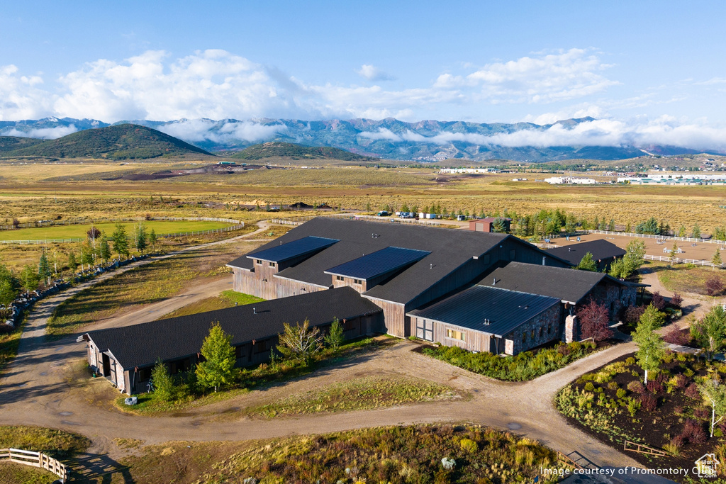 View of subject property with a mountainous background