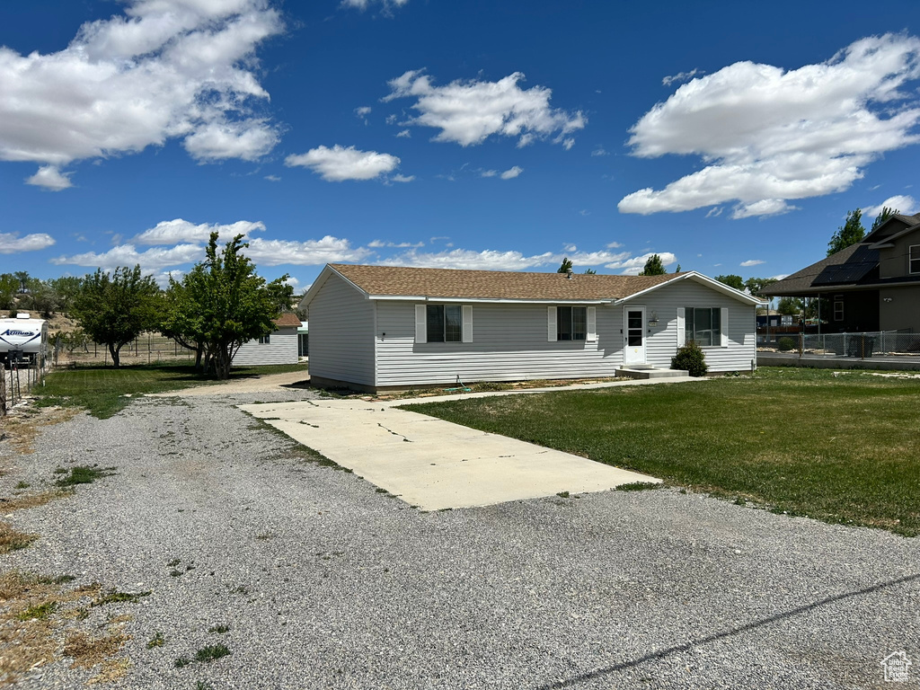 View of front of property featuring driveway