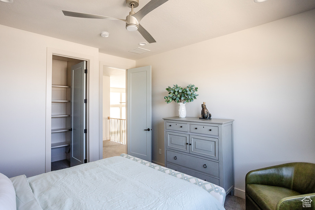 Bedroom with light colored carpet, a ceiling fan, recessed lighting, and baseboards
