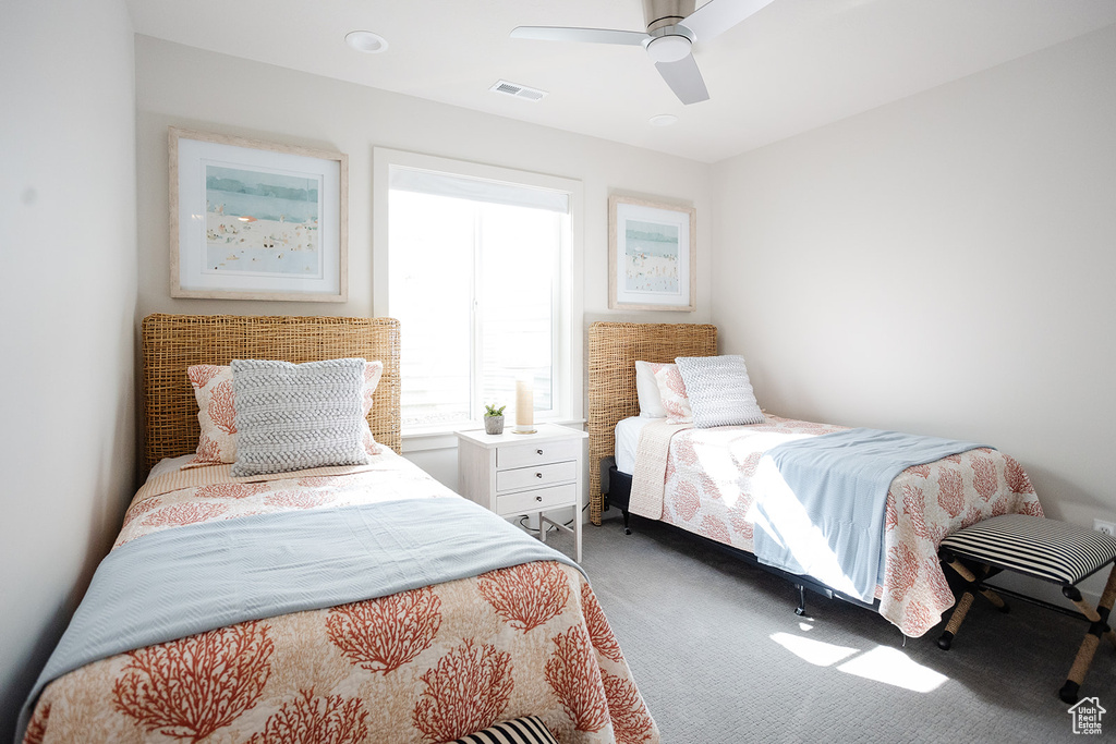 Bedroom with carpet and ceiling fan