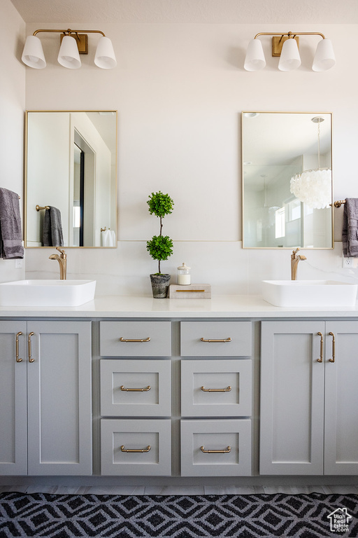 Bathroom featuring double vanity