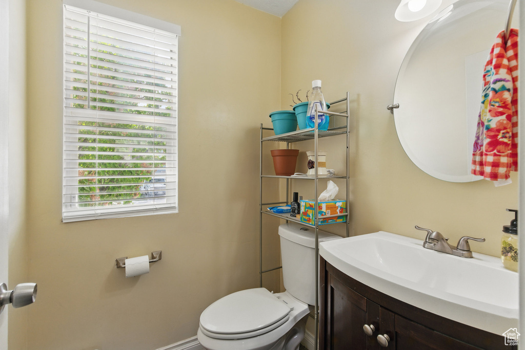 Half bath with toilet and vanity