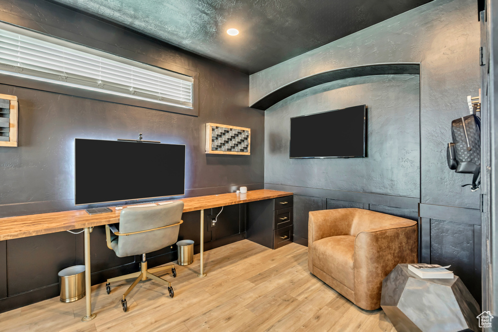 Office area with wood finished floors