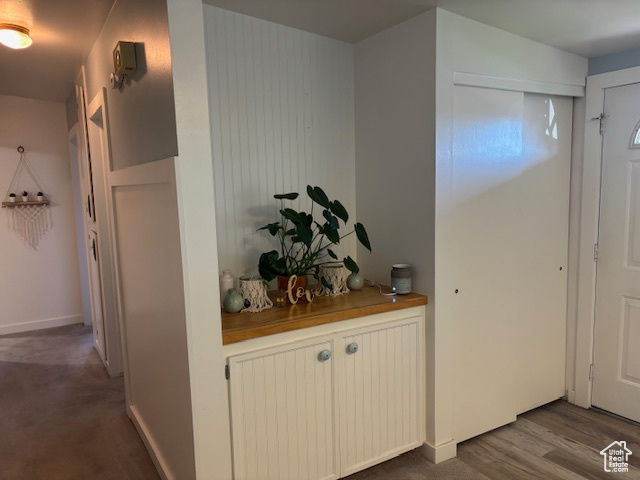 Hall featuring baseboards