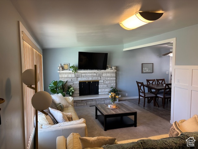 Living room with a stone fireplace