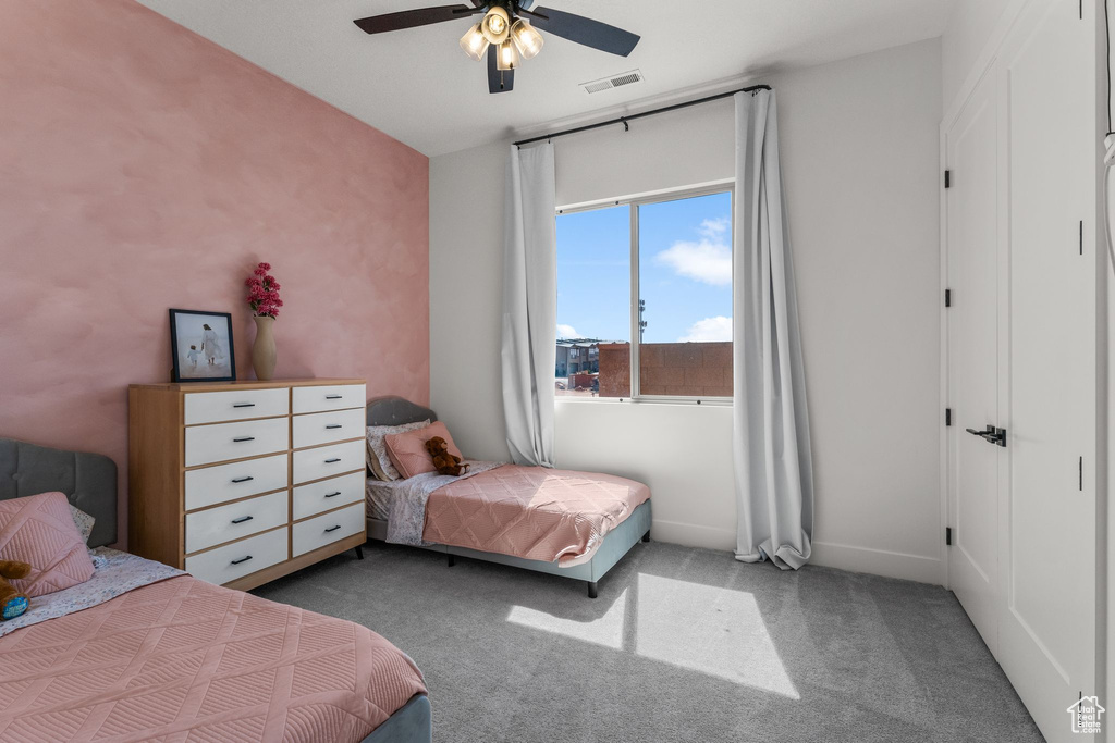 Bedroom featuring carpet flooring and ceiling fan
