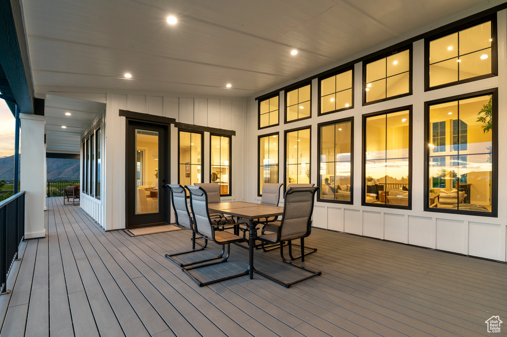 Wooden terrace featuring outdoor dining space
