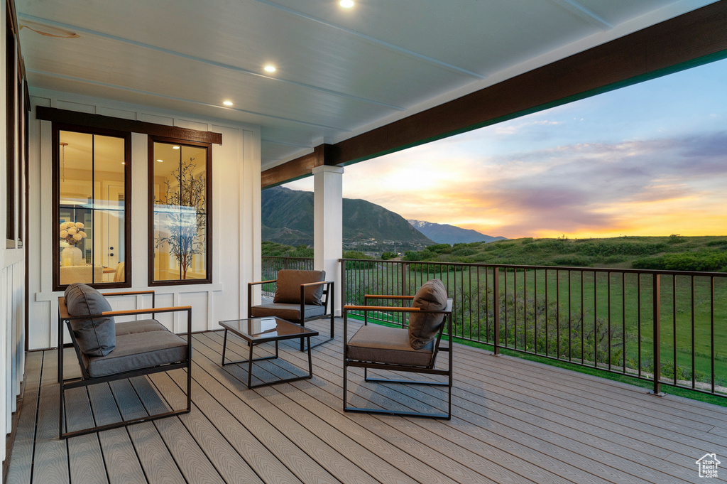Deck at dusk with a mountain view