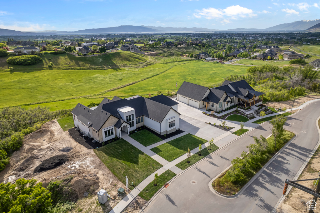 Aerial perspective of suburban area featuring mountains