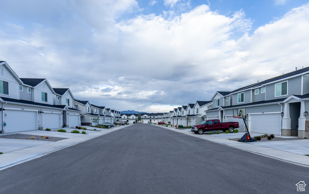 View of asphalt street with a residential view