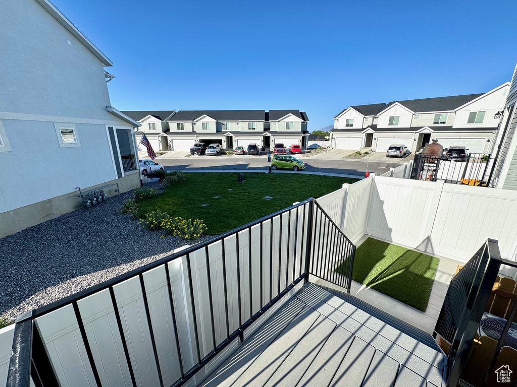 Wooden deck featuring a residential view