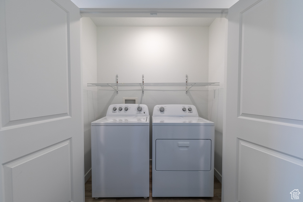 Laundry room with washing machine and dryer