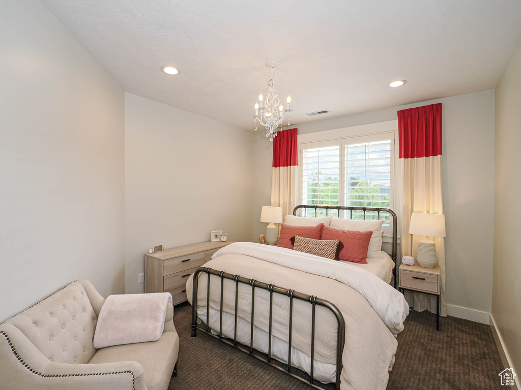 Bedroom featuring a chandelier, baseboards, carpet floors, and recessed lighting