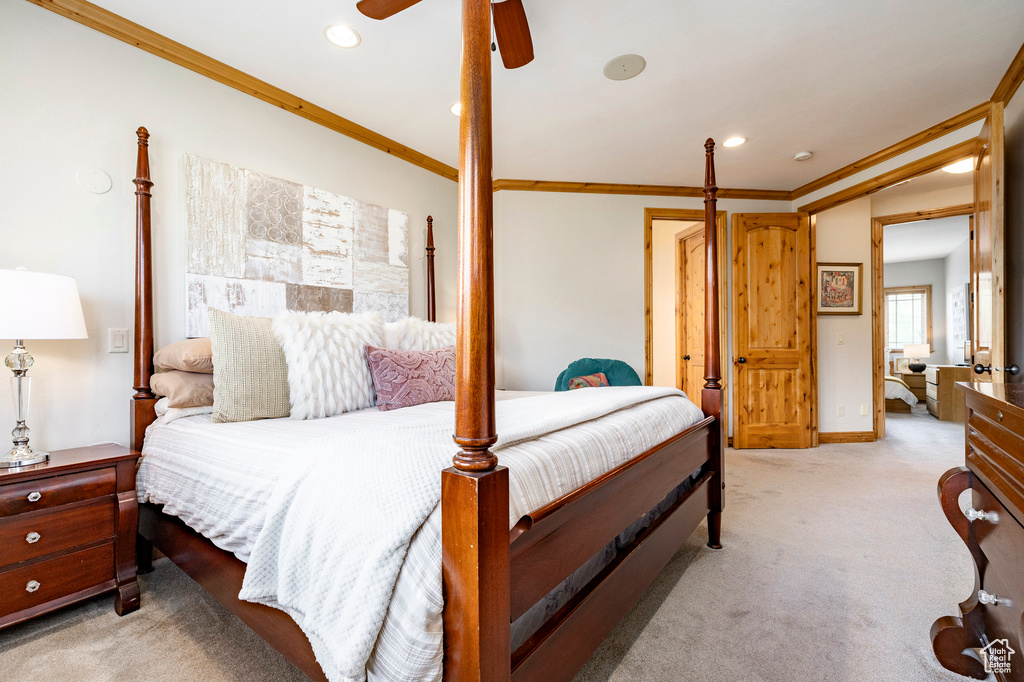 Bedroom featuring ornamental molding, light colored carpet, recessed lighting, a ceiling fan, and baseboards