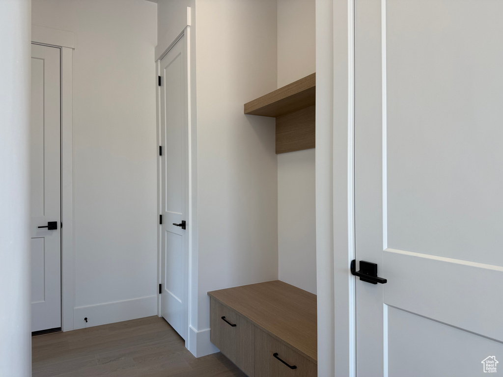 Mudroom with light wood-type flooring