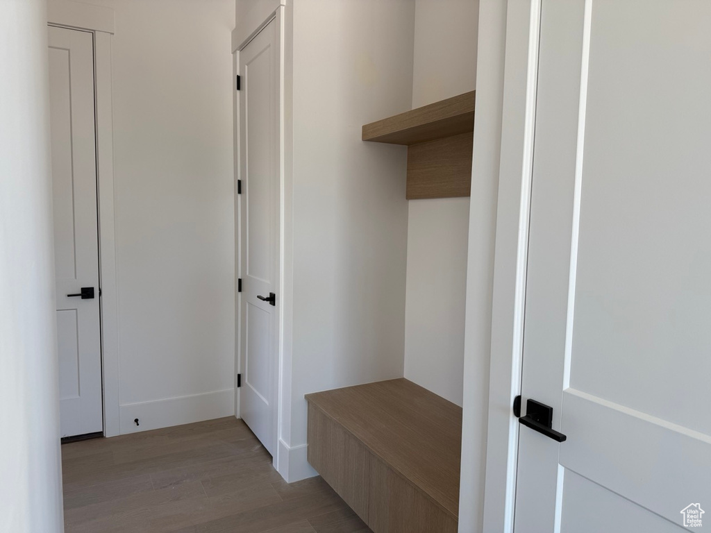 Mudroom featuring light wood-style floors
