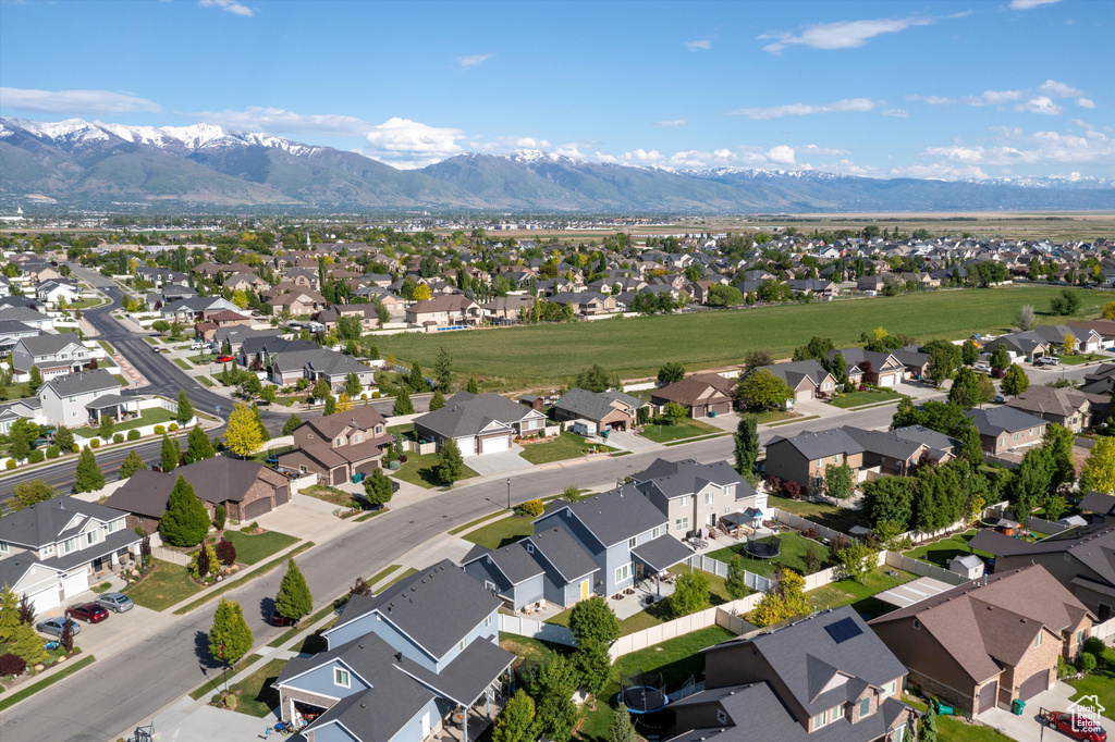Aerial view of residential area with a mountain backdrop