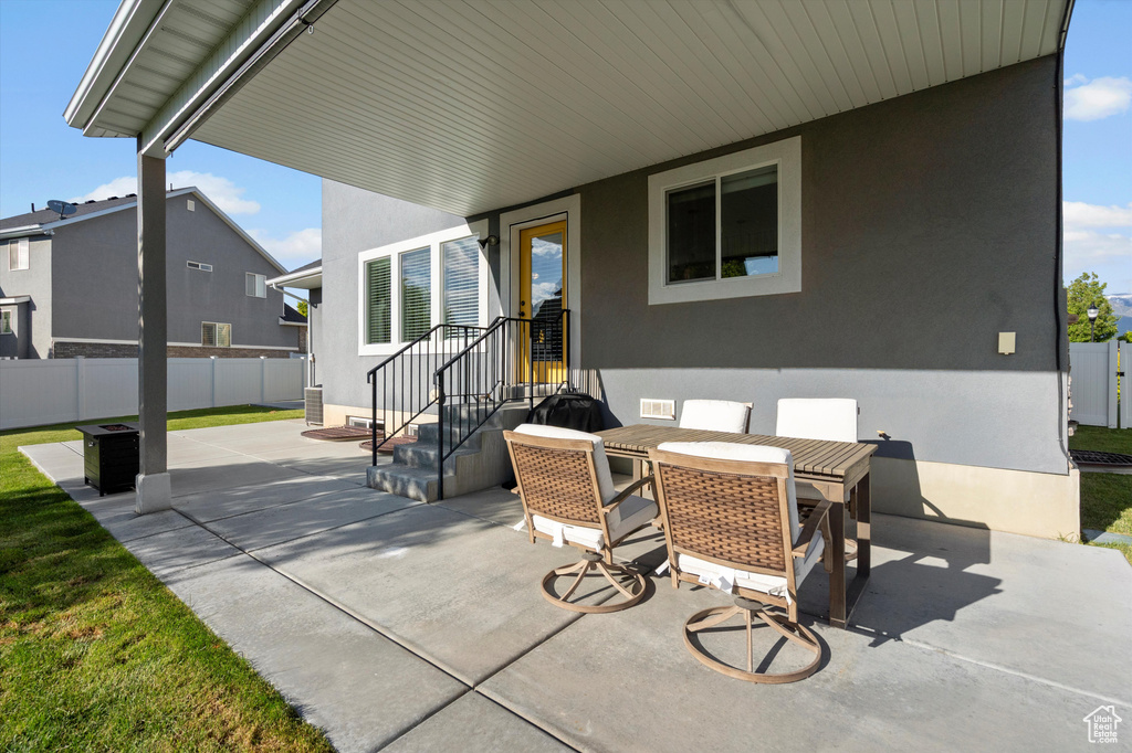 View of patio featuring outdoor dining area