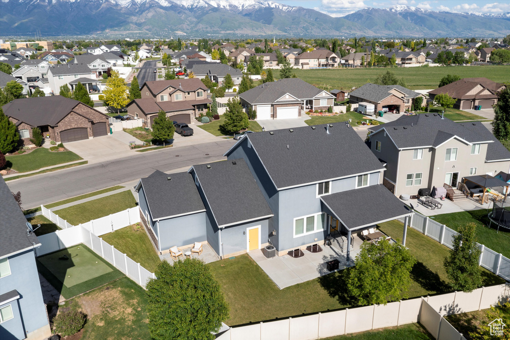 Aerial perspective of suburban area featuring mountains