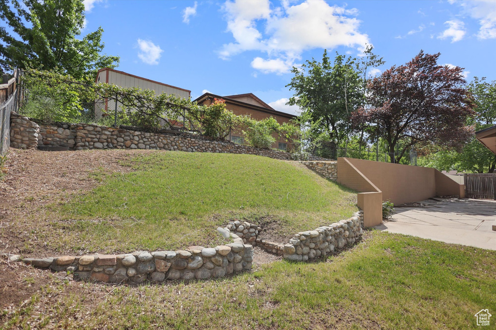 View of yard with a patio