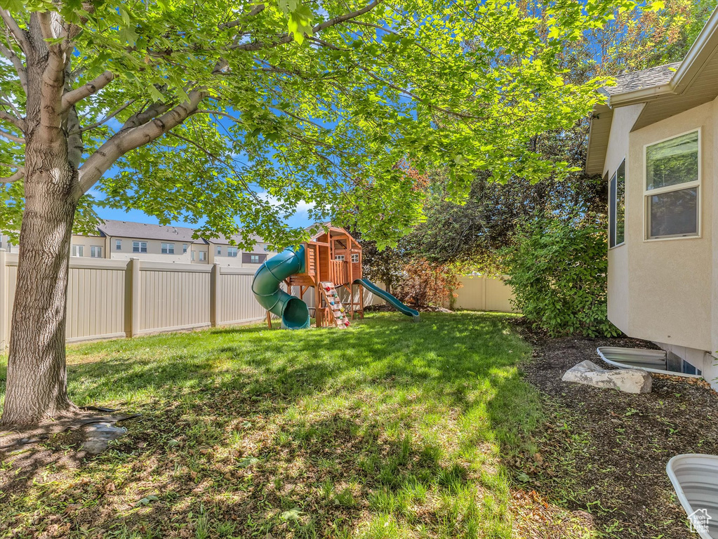 View of yard featuring a playground