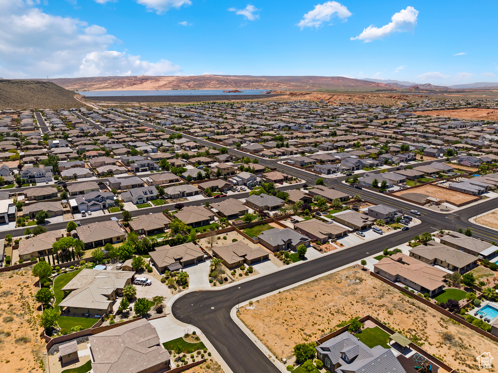 Aerial perspective of suburban area featuring a water and mountain view