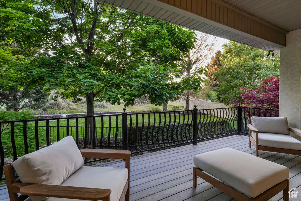 Deck featuring a lawn