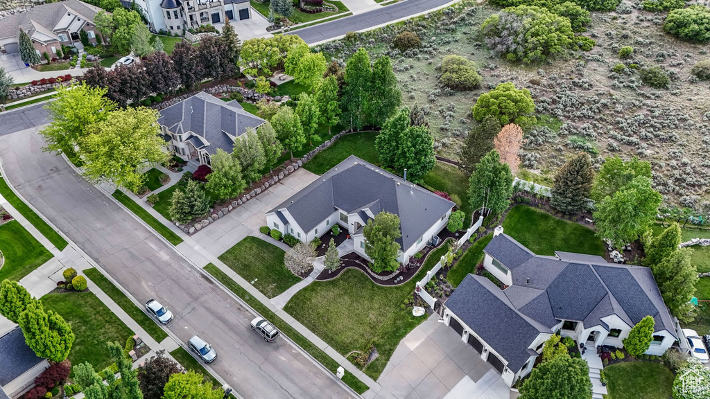 Aerial view of property's location featuring nearby suburban area