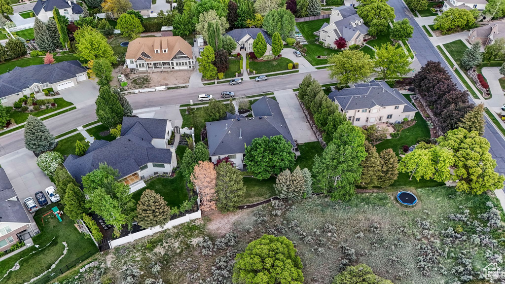 Aerial overview of property's location featuring nearby suburban area
