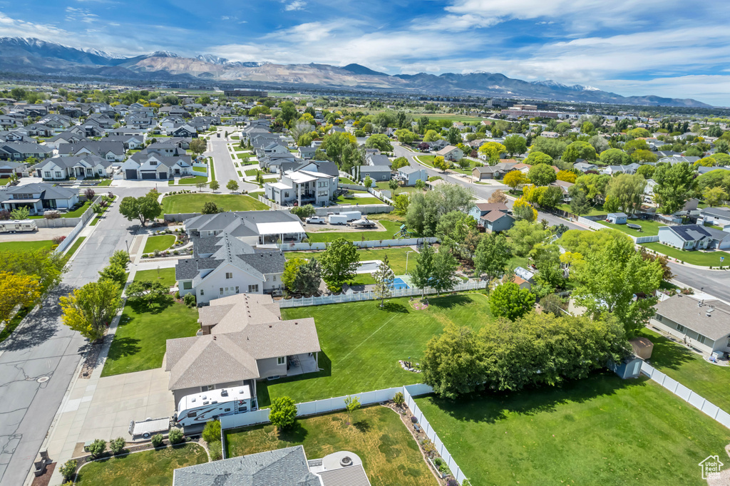 Aerial view of residential area with a mountain backdrop