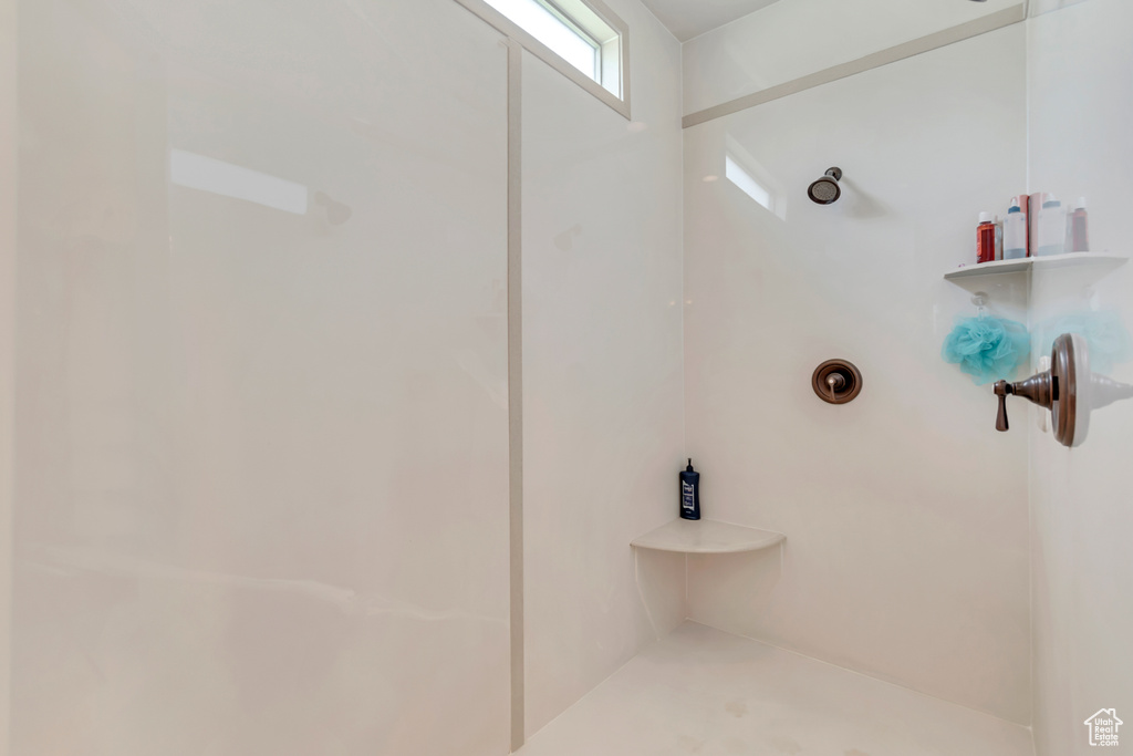 Full bath featuring a shower