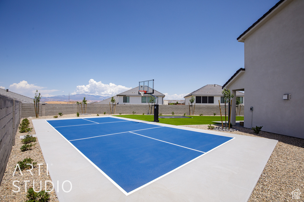 View of basketball court with basketball court and a mountain view