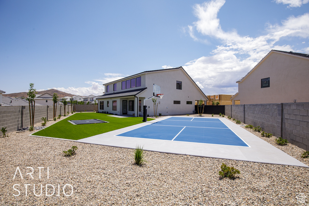 View of pool with basketball court
