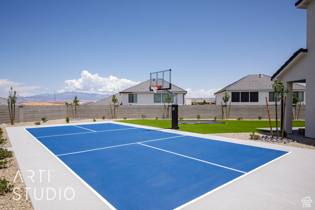 View of sport court featuring basketball court and a mountain view