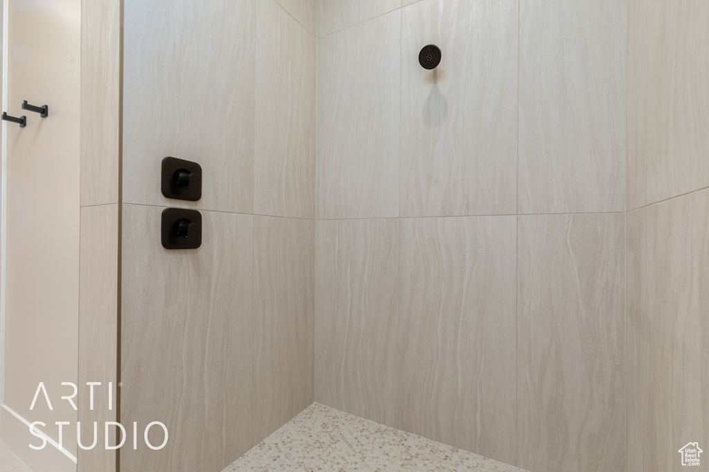 Bathroom with a tile shower