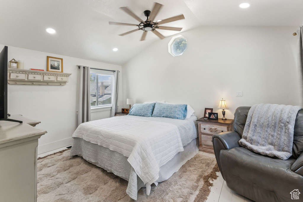 Bedroom featuring vaulted ceiling, recessed lighting, ceiling fan, and baseboards