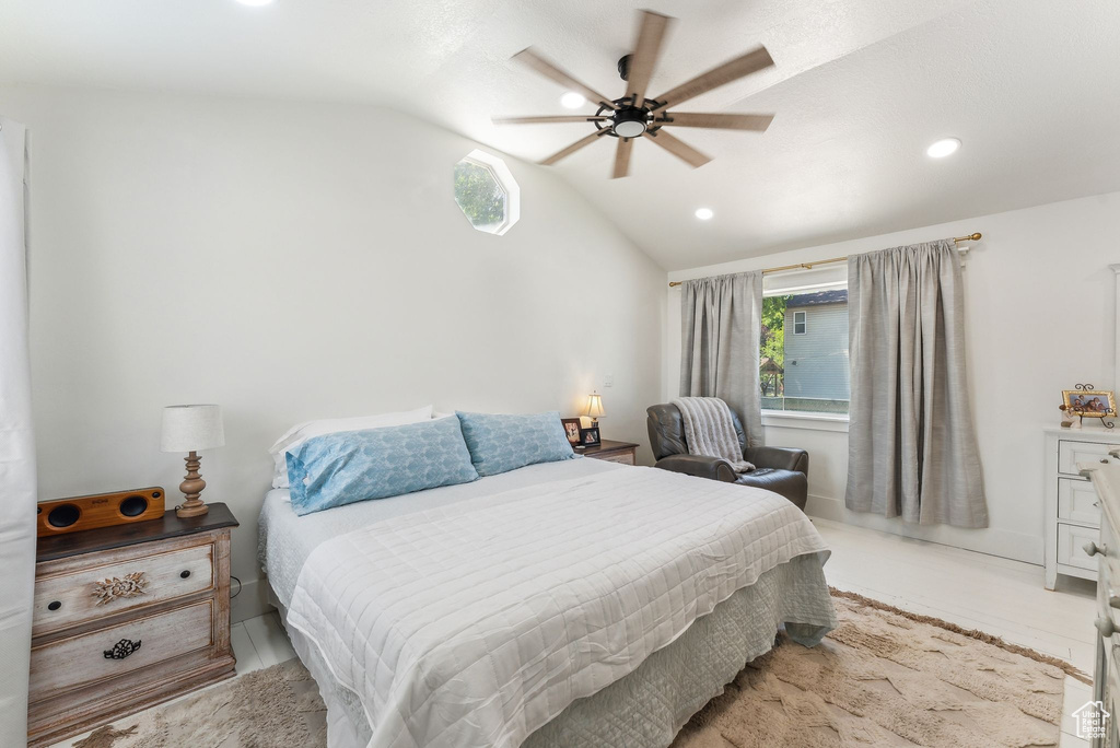 Bedroom featuring vaulted ceiling, recessed lighting, and ceiling fan
