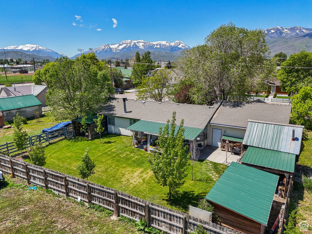 View of subject property with mountains