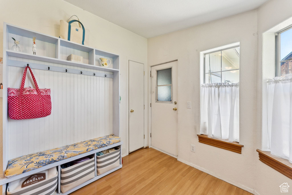 Mudroom with wood finished floors